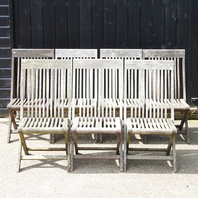 Lot 60 - A set of seven teak garden chairs (7)