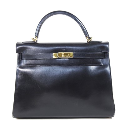 Lot 55 - An Hermes Kelly handbag, 2000, in black...