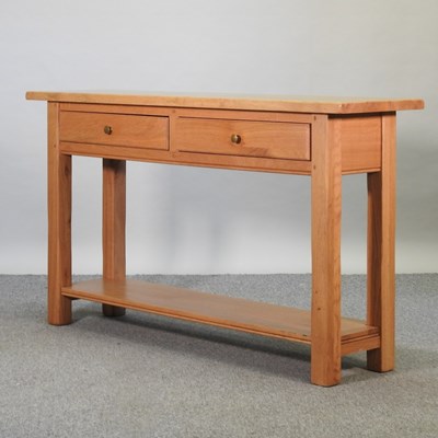 Lot 455 - A modern light oak console table