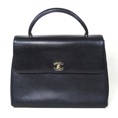 Lot 120 - A Chanel Kelly style handbag, in black caviar...