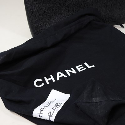 Lot 120 - A Chanel Kelly style handbag, in black caviar...