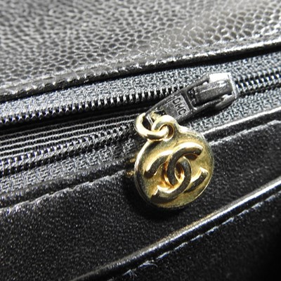 Lot 120 - A Chanel Kelly style handbag, in black caviar...