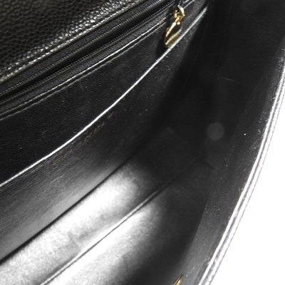 Lot 120 - A Chanel Kelly style handbag, in black caviar...