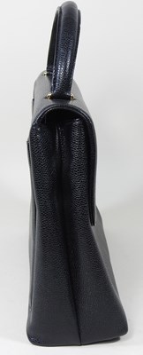 Lot 120 - A Chanel Kelly style handbag, in black caviar...
