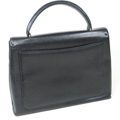 Lot 120 - A Chanel Kelly style handbag, in black caviar...
