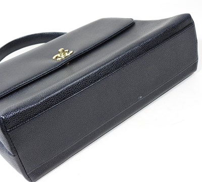 Lot 120 - A Chanel Kelly style handbag, in black caviar...