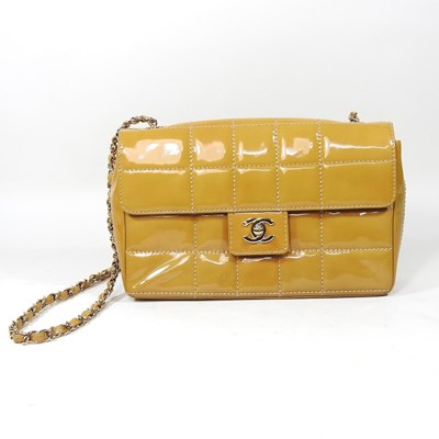 Lot 4 - A Chanel Choco Bar clutch bag, in caramel...