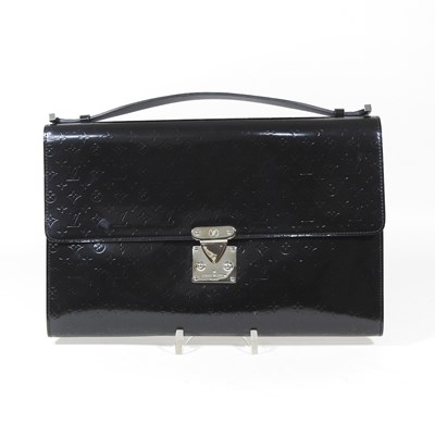 Lot 267 - A Louis Vuitton clutch bag, in black patent...