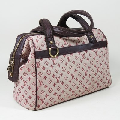 Lot 74 - A Louis Vuitton Mini Lin handbag, in burgundy...