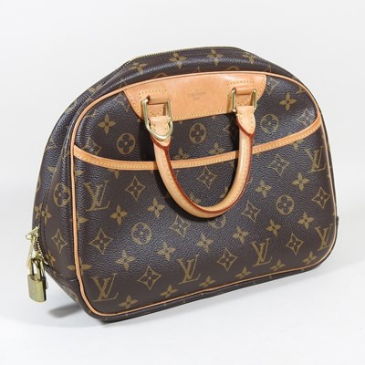 Lot 101 - A Louis Vuitton Trouville bag, in brown...