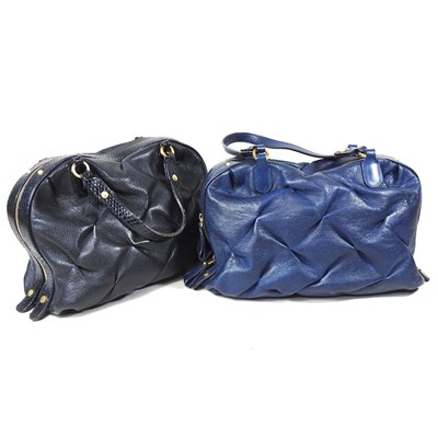 Lot 558 - A Smythson handbag, in navy leather, 35cm wide,...