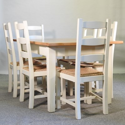 Lot 456 - A light oak and white painted dining table