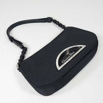 Lot 159 - A Christian Dior Malice Baguette evening bag,...