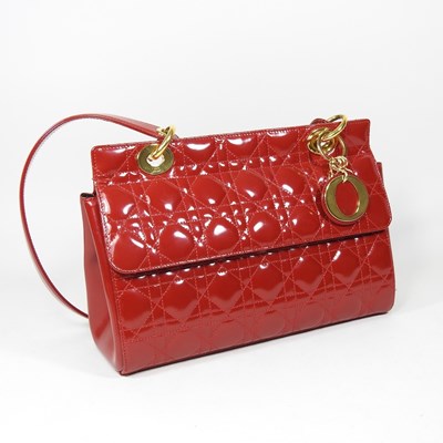 Lot 109 - A Christian Dior handbag, in red quilted...