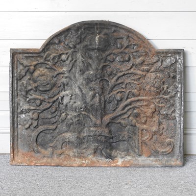 Lot 345 - A large cast iron fireback, of arched shape,...