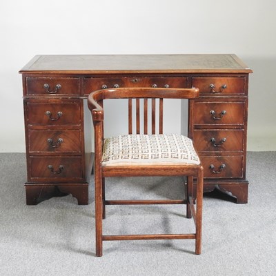 Lot 168 - A reproduction twin pedestal desk, with an...