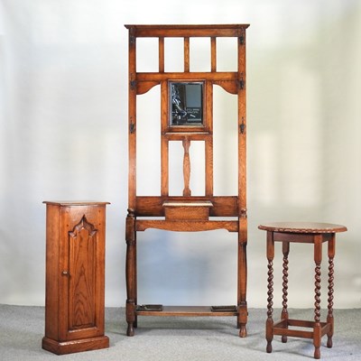 Lot 657 - An Edwardian oak hall stand