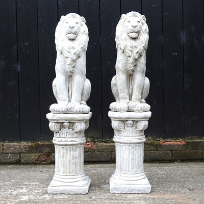 Lot 111 - A pair of cast stone garden models of lions,...