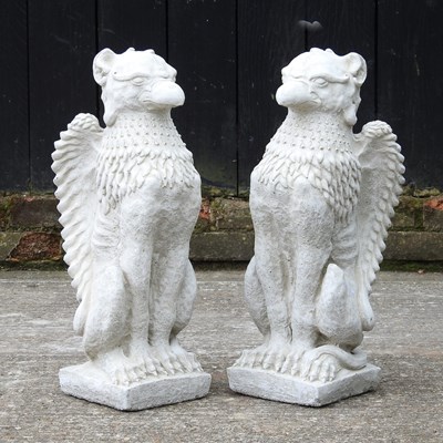 Lot 292 - A pair of cast stone garden statues of...