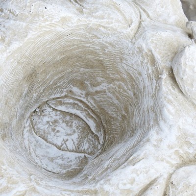 Lot 128 - A pair of cast stone lion mask garden planters,...