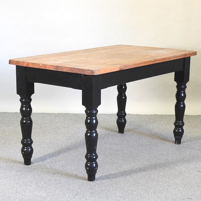 Lot 457 - A pine dining table