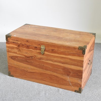 Lot 321 - A brass bound hardwood trunk, with a hinged lid