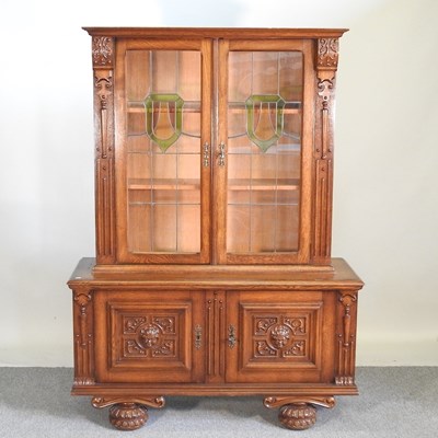 Lot 202 - An early 20th century continental carved oak...