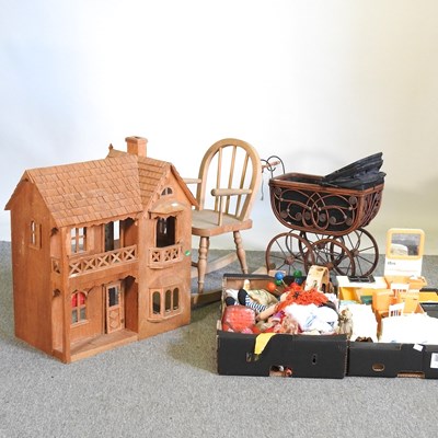 Lot 90 - A wooden doll's house, 53cm wide, together...