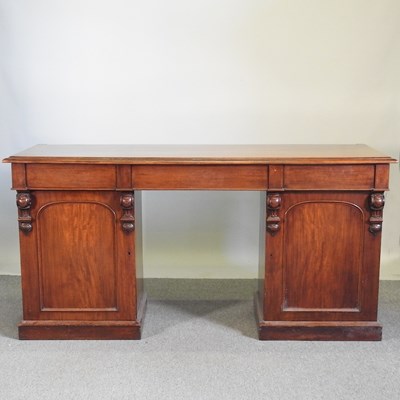 Lot 475 - A Victorian mahogany pedestal sideboard, on a...