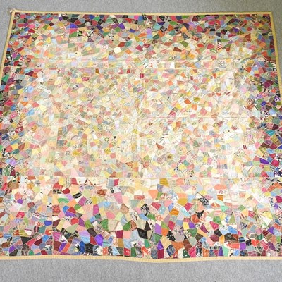 Lot 127 - A vintage patchwork quilt, with all over...