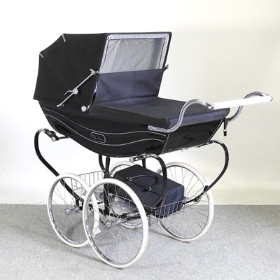 Lot 335 - A Silver Cross pram, with a black canvas cover,...