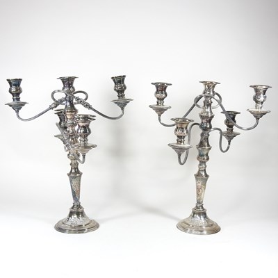 Lot 167 - A pair of silver plated four branch table...