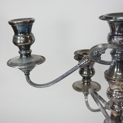 Lot 167 - A pair of silver plated four branch table...