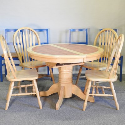 Lot 461 - A tile top beech extending dining table