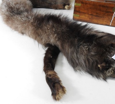 Lot 124 - A Victorian walnut and brass bound writing...