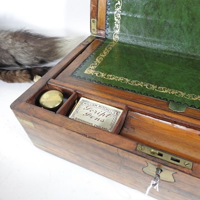 Lot 124 - A Victorian walnut and brass bound writing...