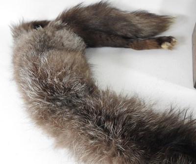 Lot 124 - A Victorian walnut and brass bound writing...