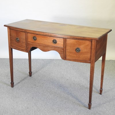 Lot 664 - An early 20th century mahogany bow front sideboard