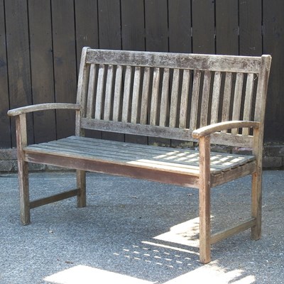 Lot 190 - A slatted wooden garden bench