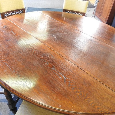 Lot 532 - An 18th century style oak gateleg dining table,...