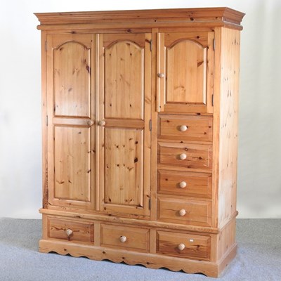 Lot 413 - A modern pine combination wardrobe