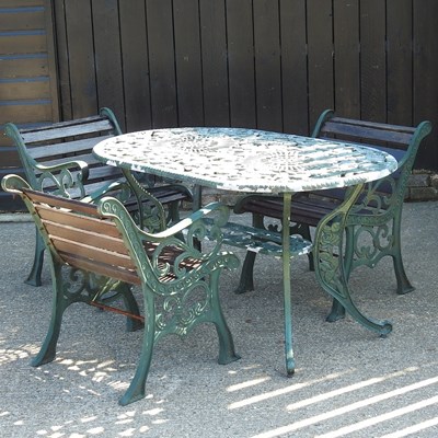 Lot 400 - A green painted metal garden table, together...