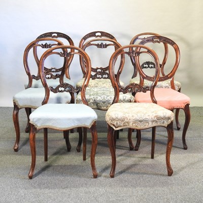 Lot 677 - A matched set of eight Victorian walnut balloon back dining chairs