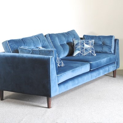 Lot 393 - A Sofology blue velvet upholstered sofa, with...