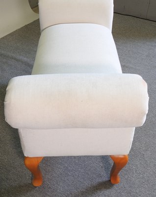 Lot 179 - A modern cream upholstered window seat, on...