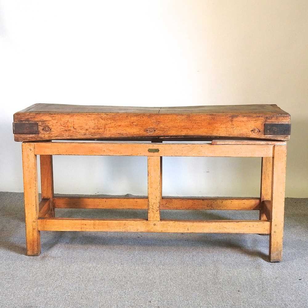 Lot 175 - A large antique butcher's block, on a pine...