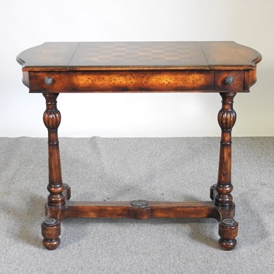 Lot 228 - A good quality reproduction inlaid games table,...