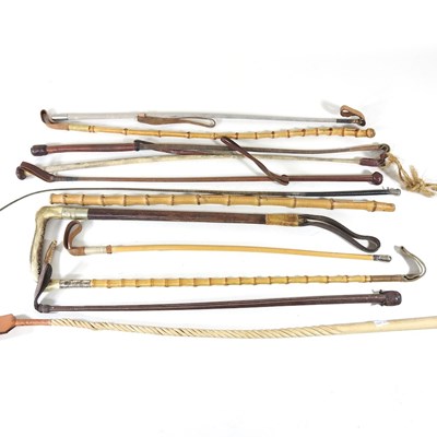 Lot 286 - A collection of riding crops and horse whips