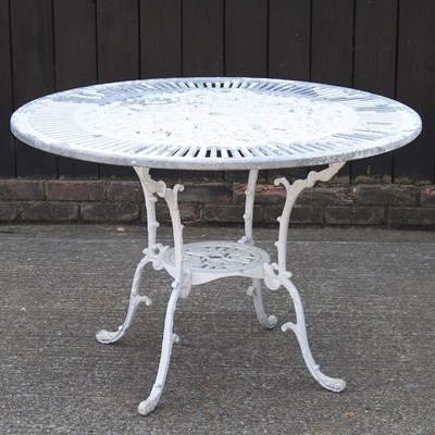 Lot 593 - A painted aluminium garden table, of circular...