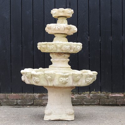 Lot 44 - A cast stone four tier garden fountain, of...